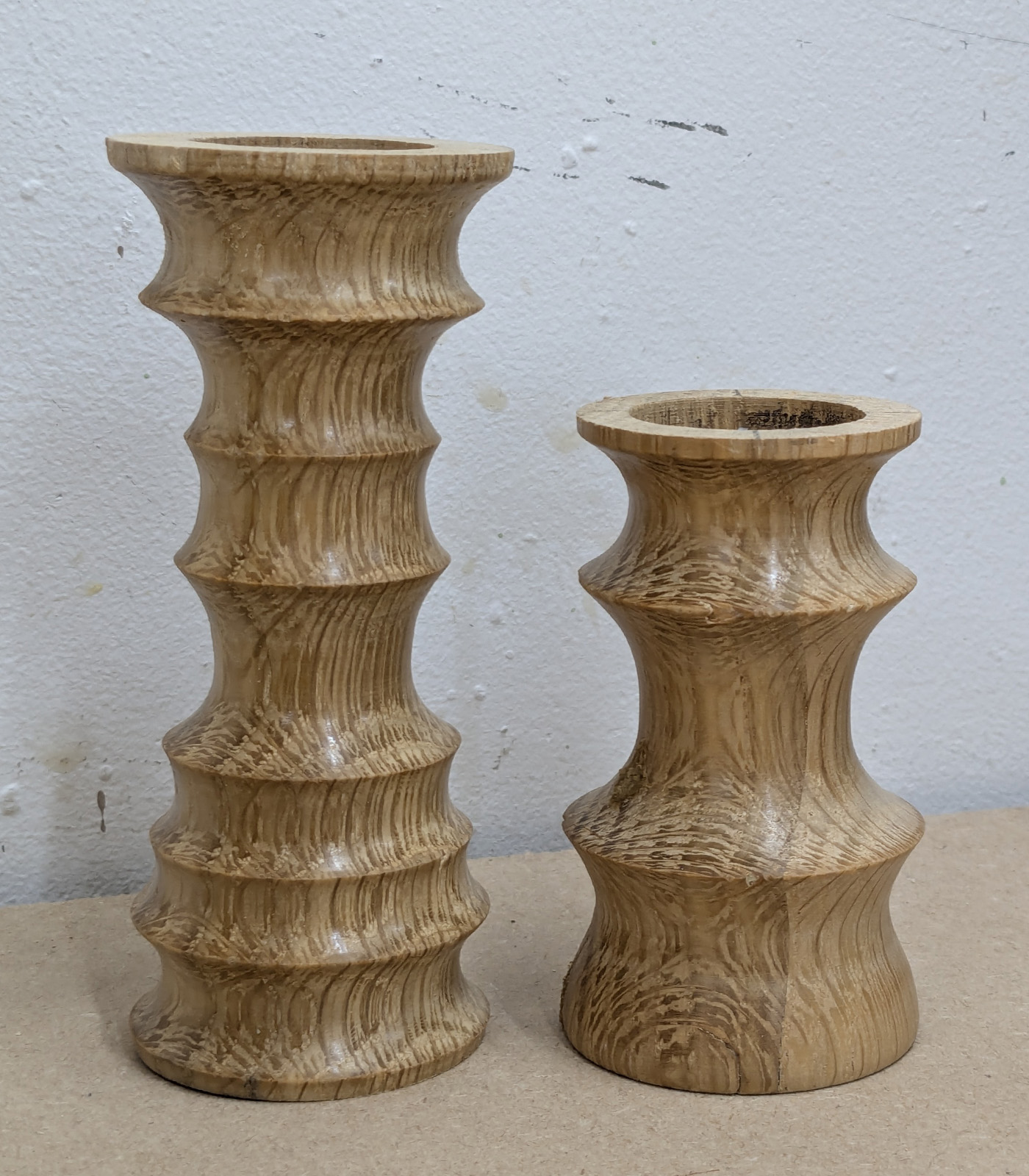 two turned candle sticks